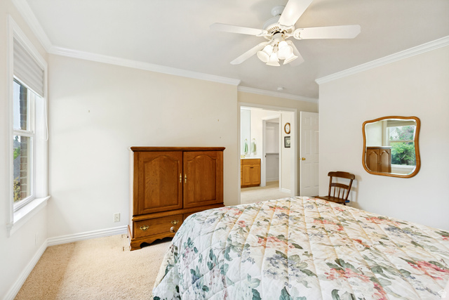 298 North Canyon Road Bountiful, UT 84010 - Photo 29 of 57 Bright interior space featuring a window with blinds, a ceiling fan with integrated lighting, and crown molding
