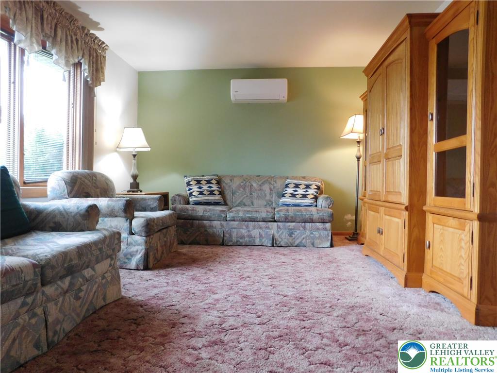 21 Will Barnesville, PA 18214 - Photo 3 of 23 A comfortable living space featuring plush carpeting and generous natural light from a well-sized window.