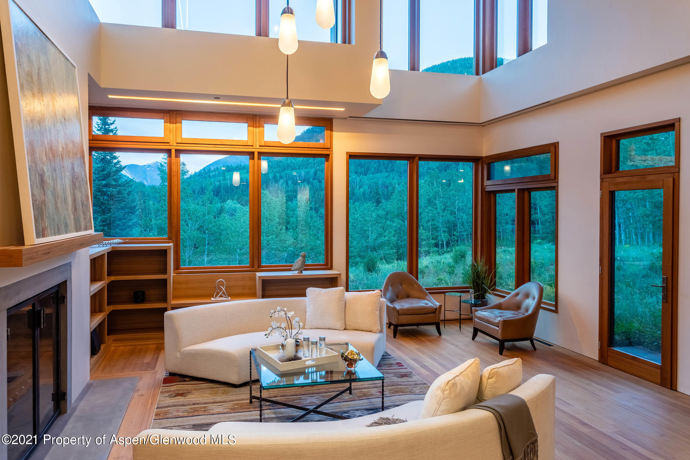 255 Conundrum Creek Road Aspen, CO 81611 - Photo 14 of 70 a outdoor living space with furniture and large windows