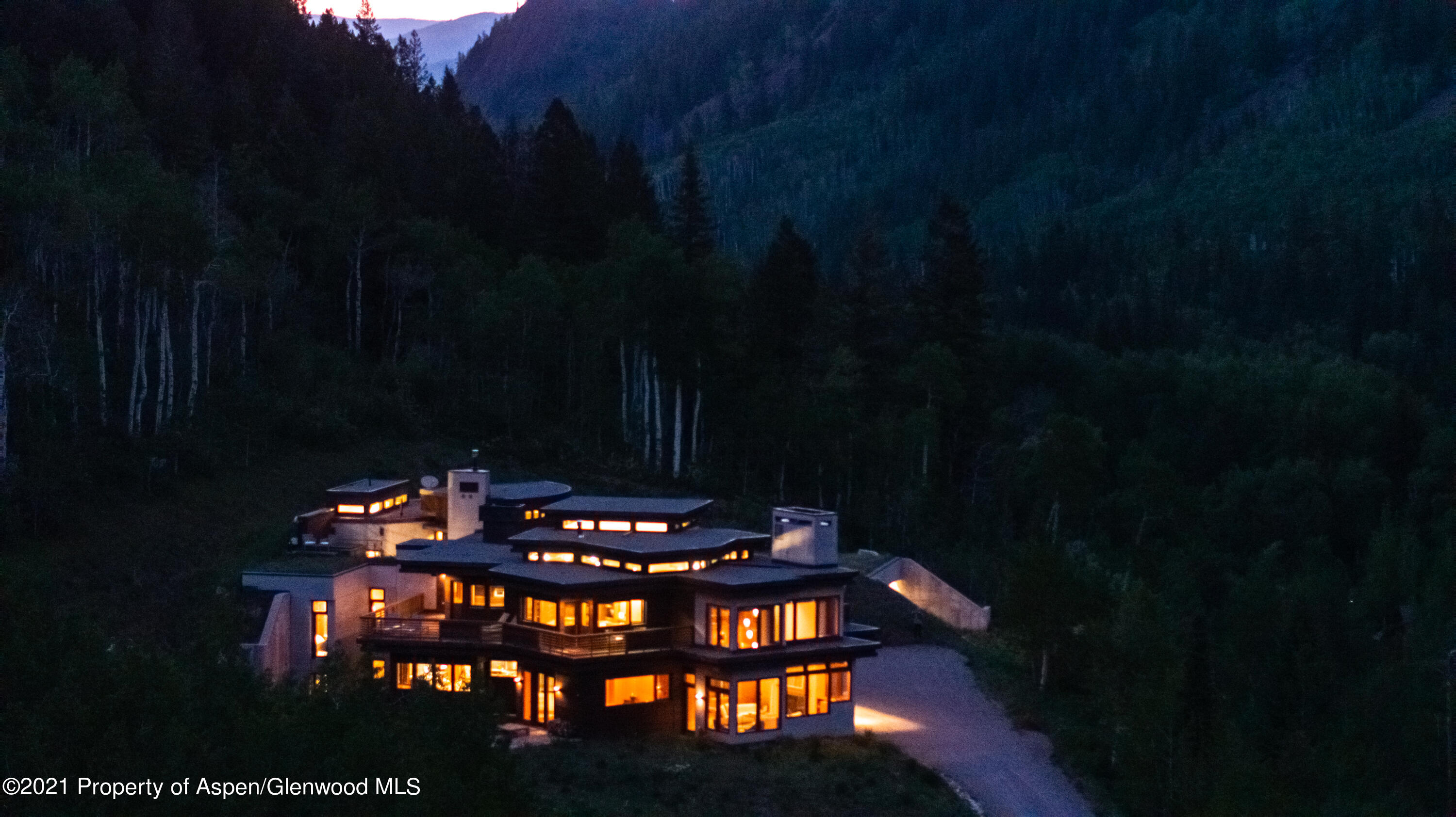 255 Conundrum Creek Road Aspen, CO 81611 - Photo 21 of 70 a view of a chairs and table in the patio