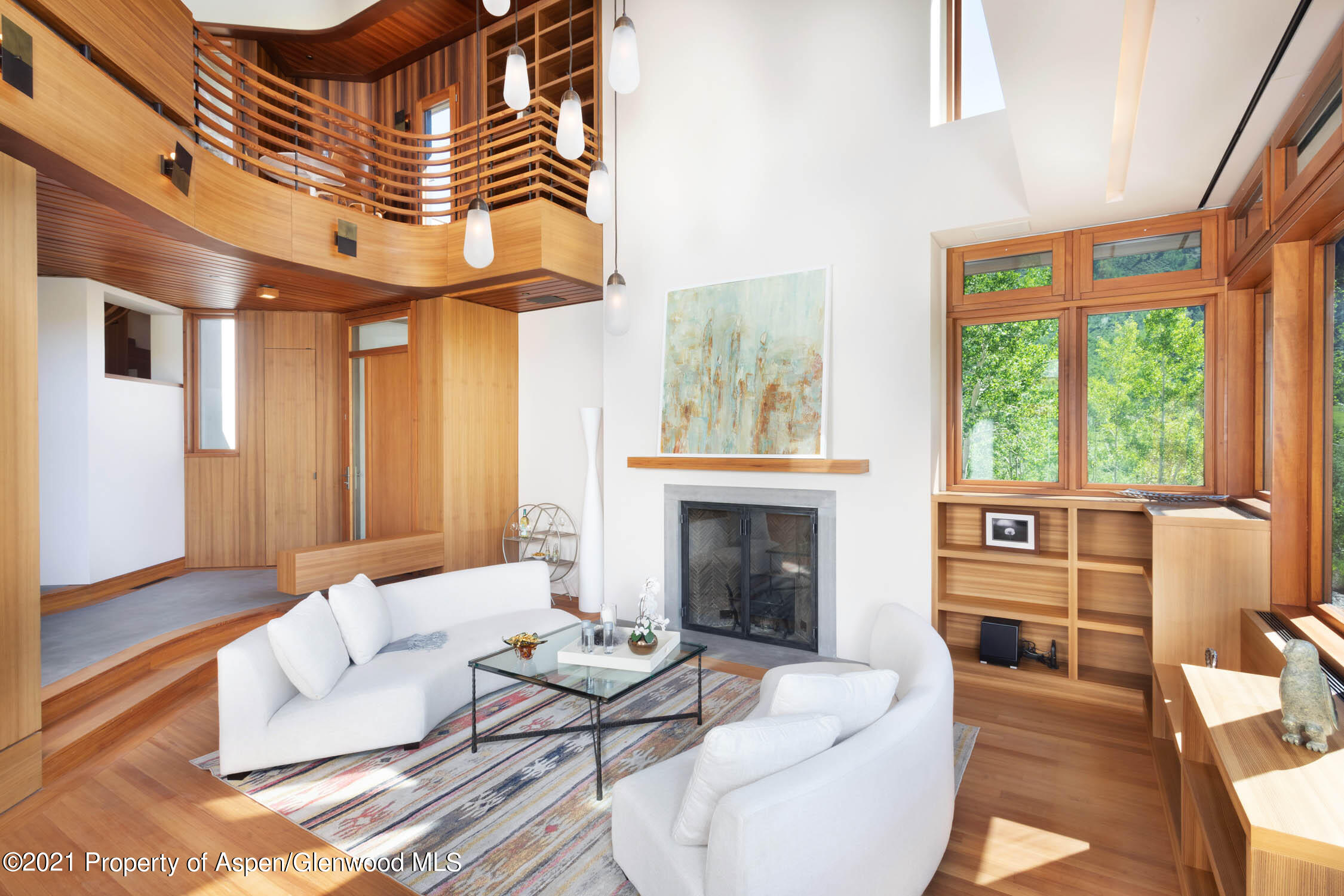 255 Conundrum Creek Road Aspen, CO 81611 - Photo 29 of 70 a living room with furniture and a fireplace