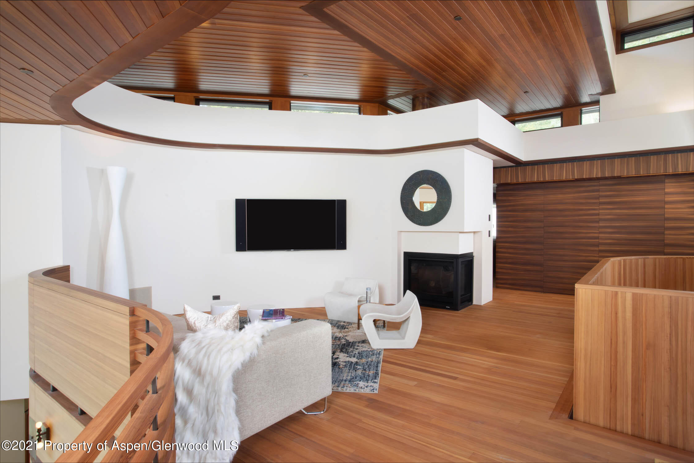 255 Conundrum Creek Road Aspen, CO 81611 - Photo 32 of 70 a living room with furniture and a fireplace
