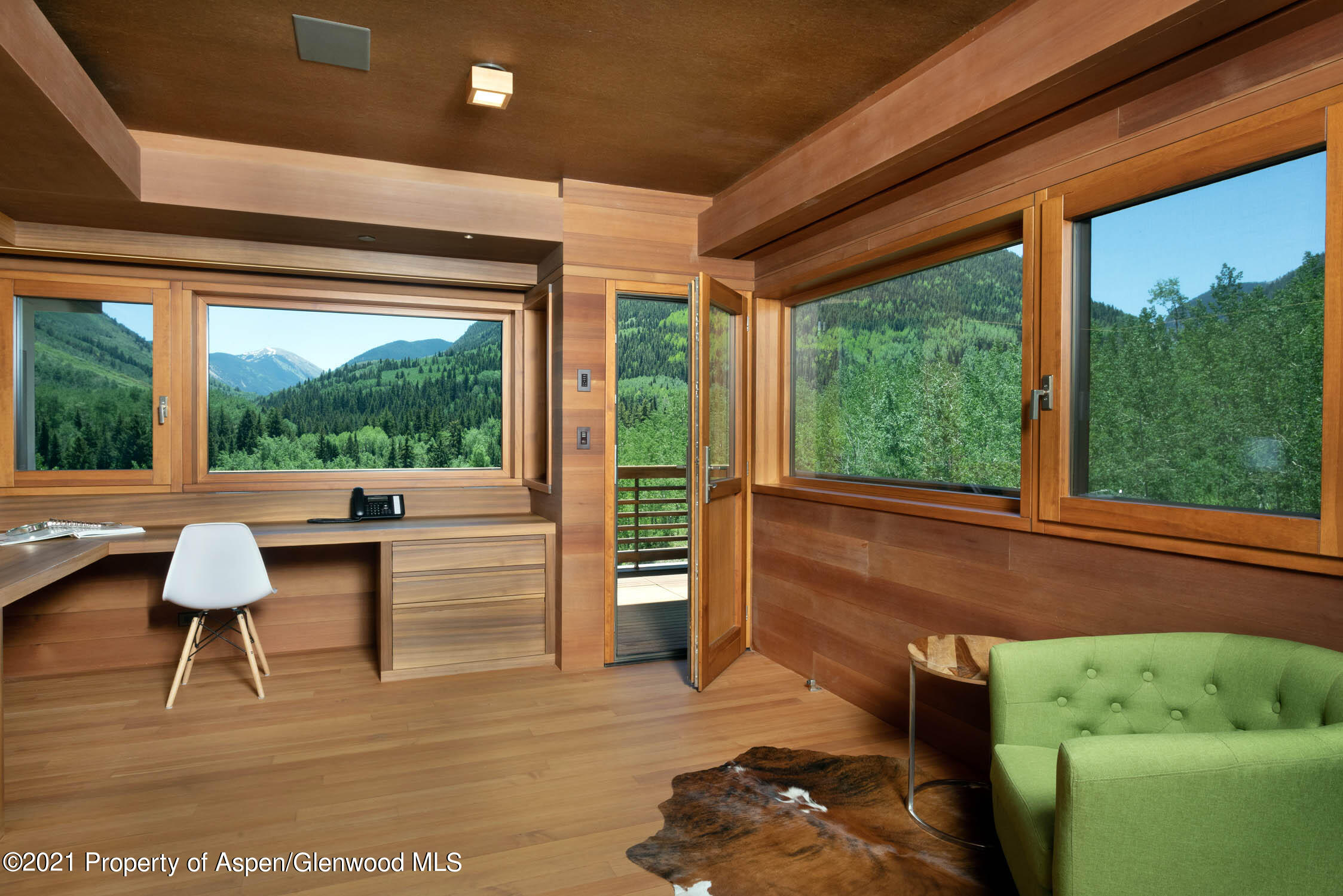255 Conundrum Creek Road Aspen, CO 81611 - Photo 36 of 70 a living room with furniture and a large window