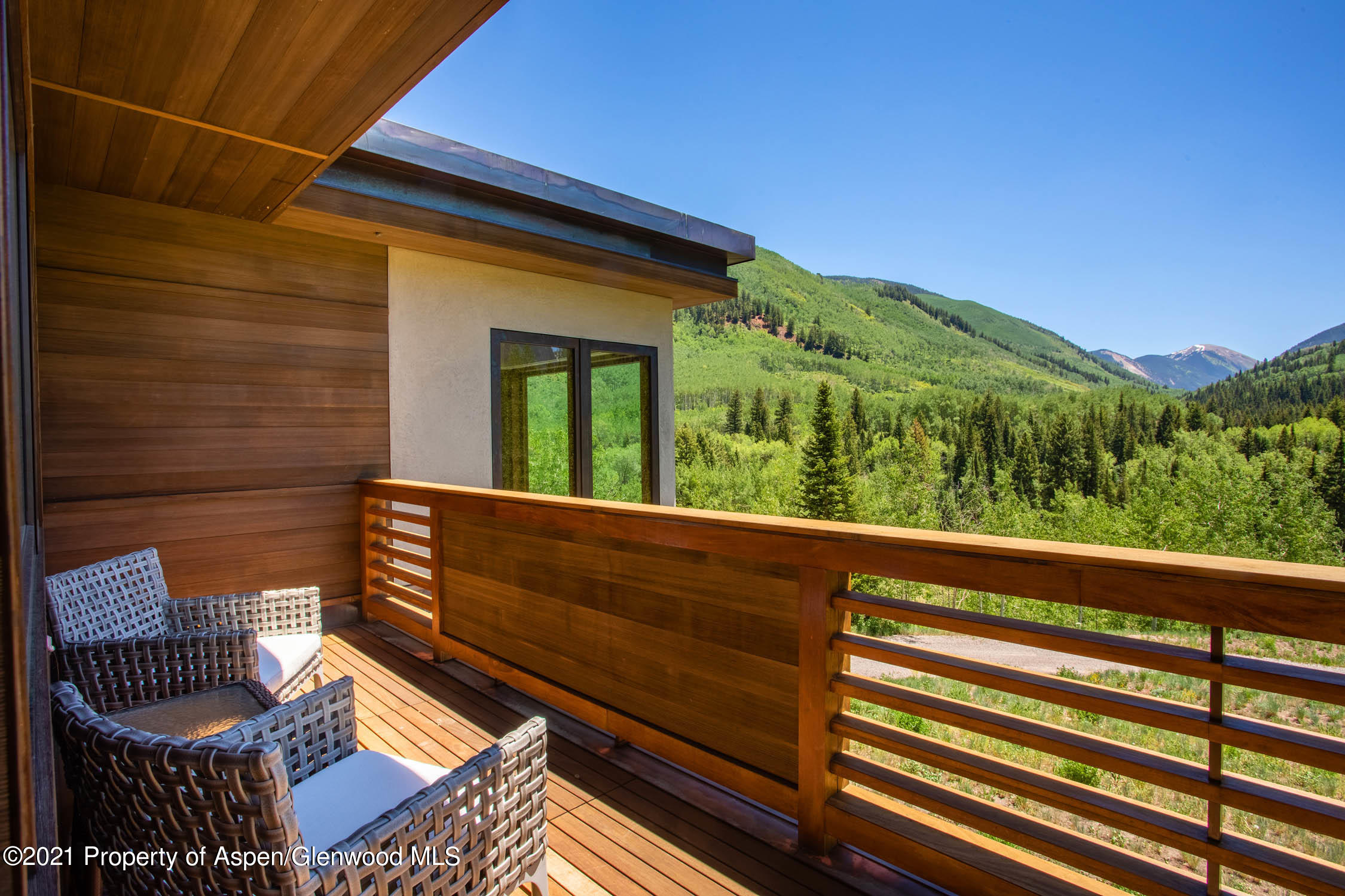 255 Conundrum Creek Road Aspen, CO 81611 - Photo 45 of 70 a view of a two chair in the balcony