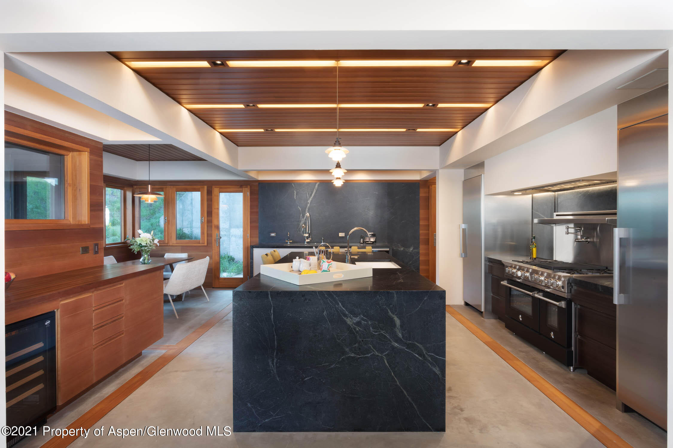 255 Conundrum Creek Road Aspen, CO 81611 - Photo 50 of 70 a large kitchen with kitchen island a counter space a sink and stainless steel appliances