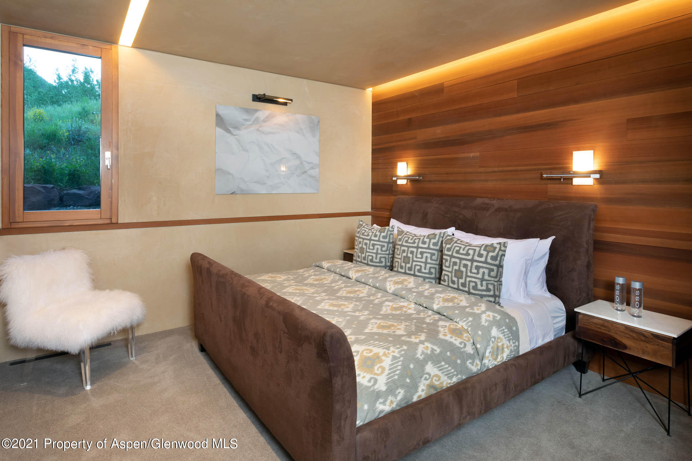 255 Conundrum Creek Road Aspen, CO 81611 - Photo 53 of 70 a bed sitting in a bedroom next to a window