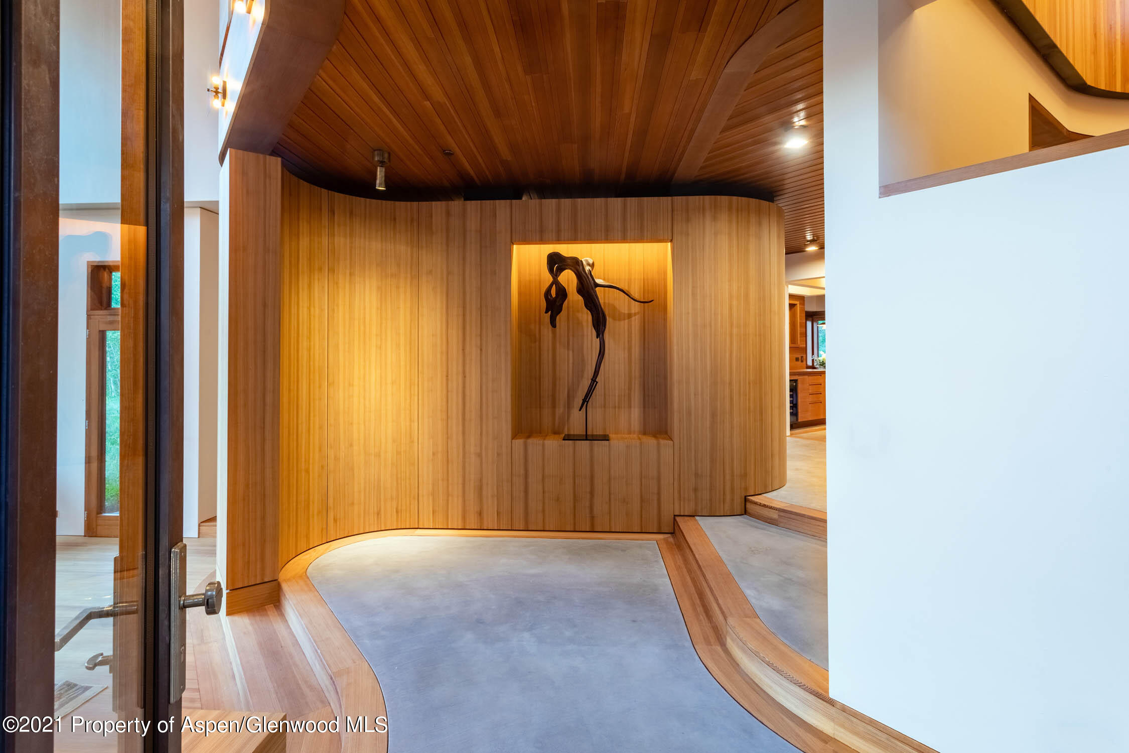 255 Conundrum Creek Road Aspen, CO 81611 - Photo 59 of 70 a bedroom with a bed and a mirror