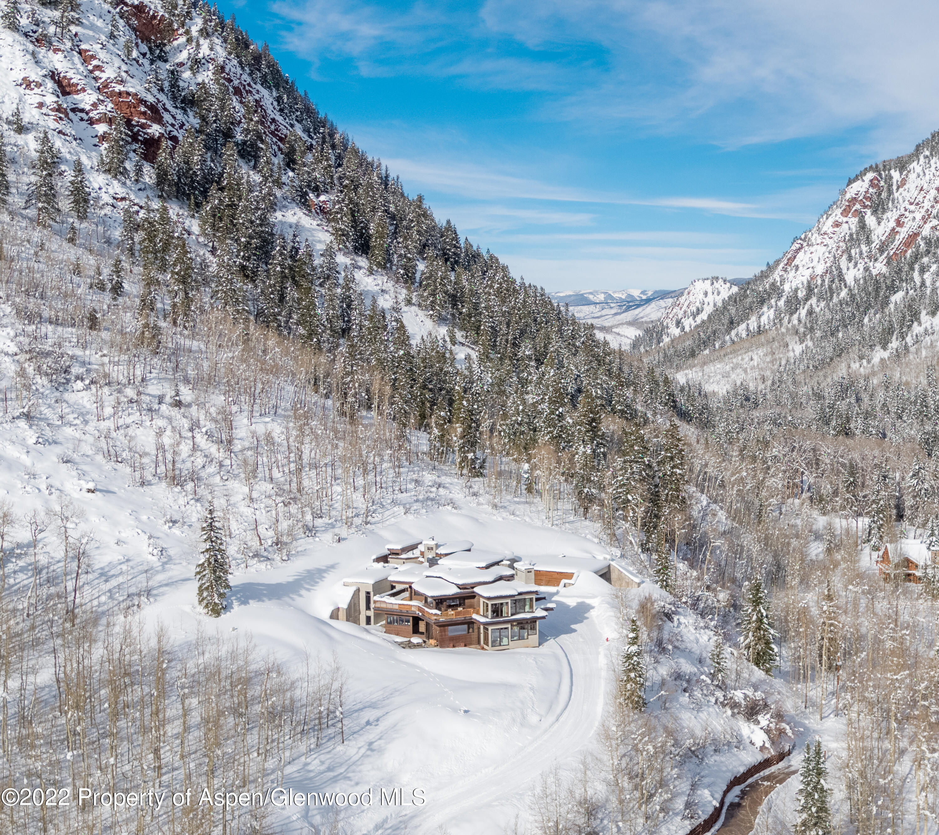 255 Conundrum Creek Road Aspen, CO 81611 - Photo 70 of 70 a view of a wooden floor with a outdoor space