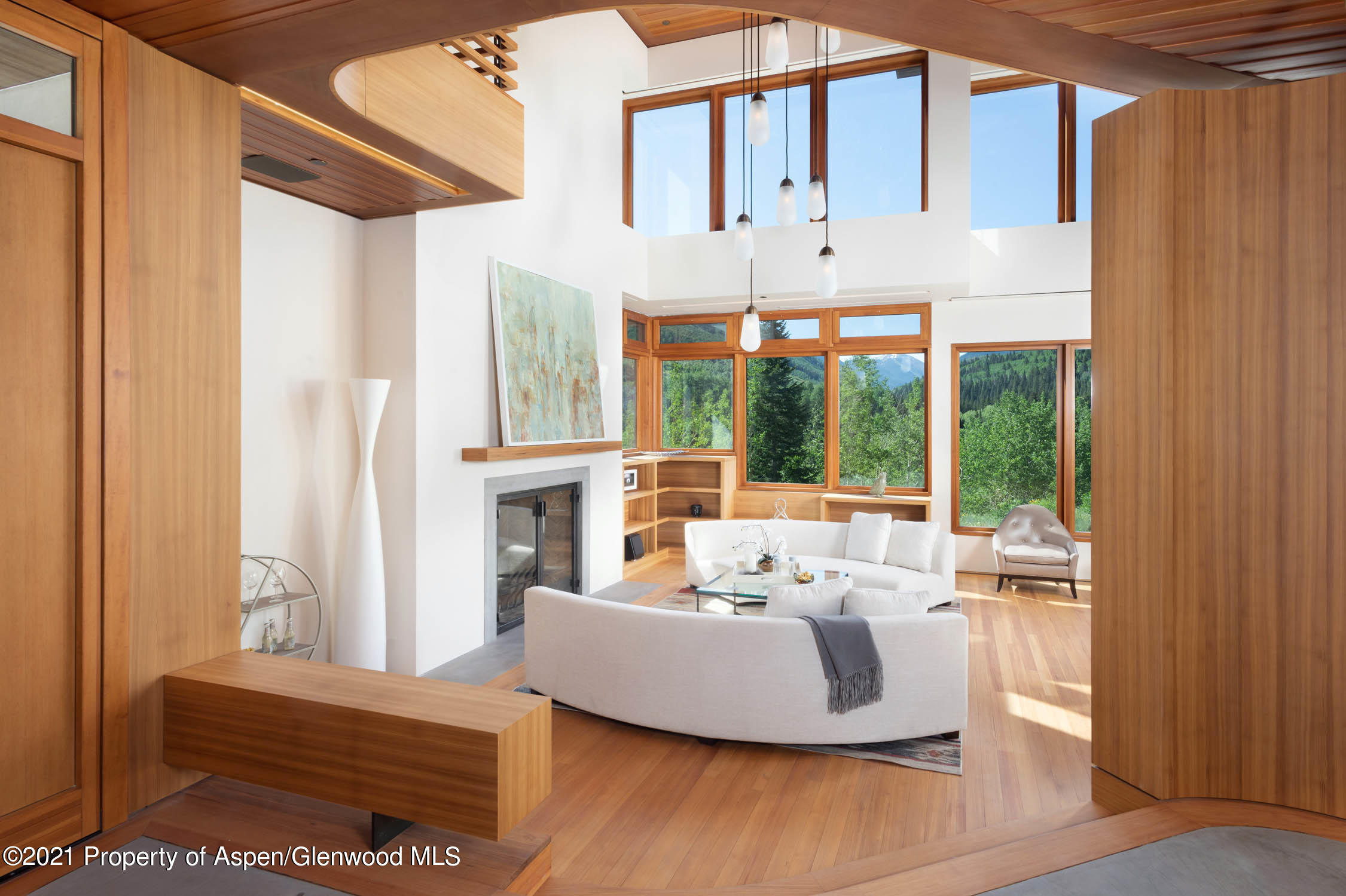 255 Conundrum Creek Road Aspen, CO 81611 - Photo 9 of 70 a living room with furniture and large windows