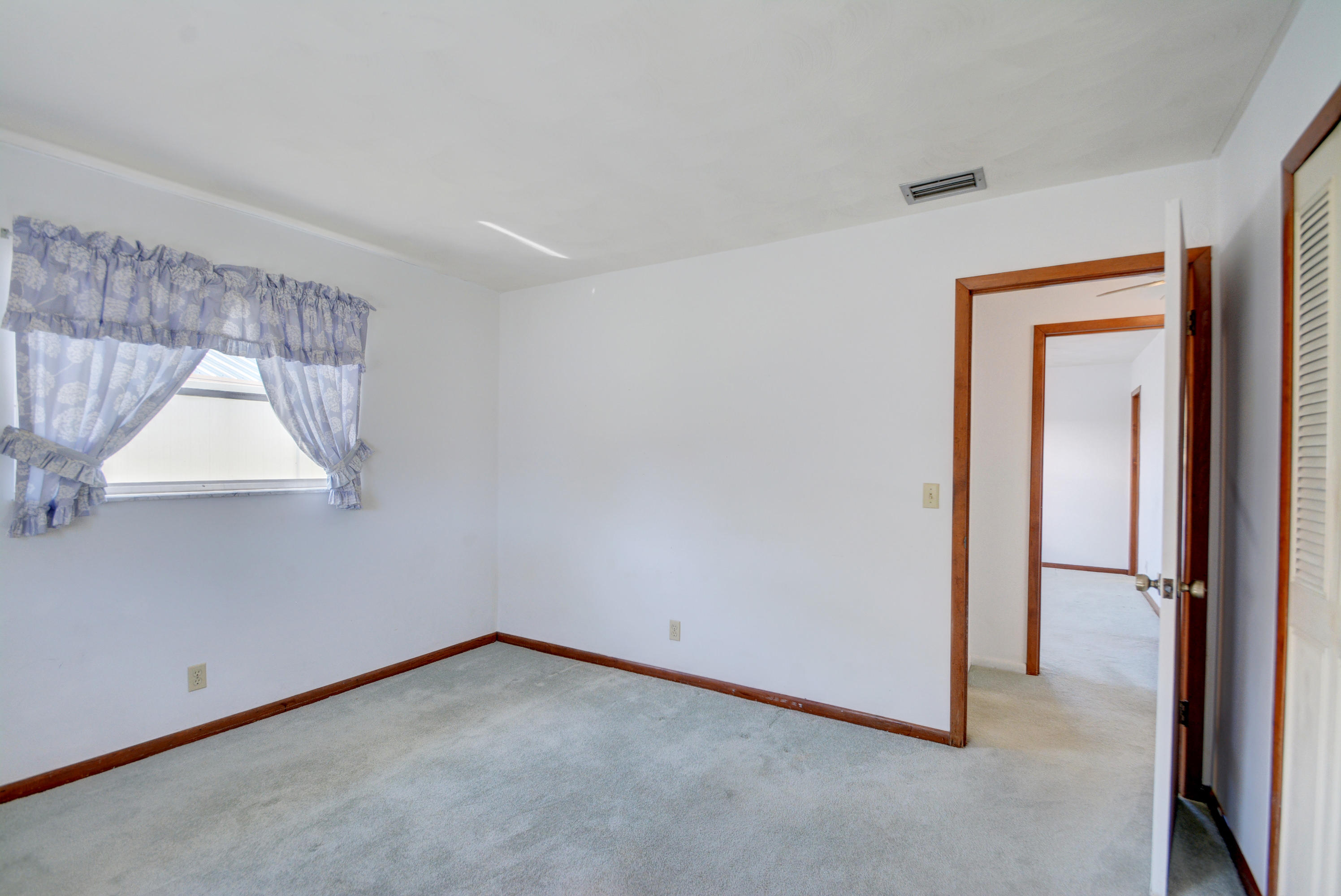 785 Southwest Salerno Road Stuart, FL 34997 - Photo 27 of 51 Guest bedroom