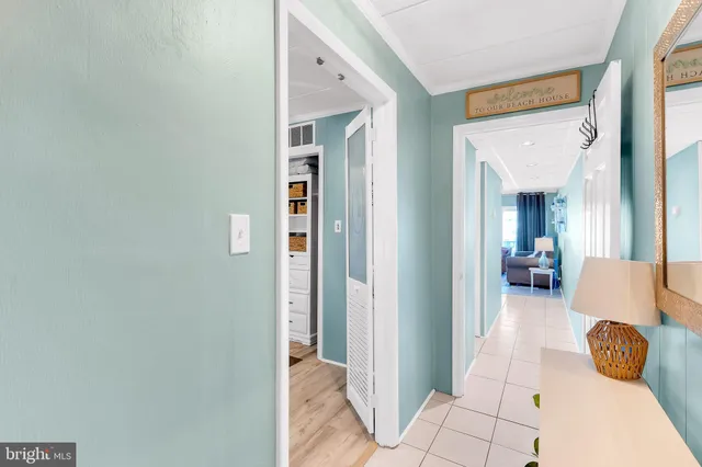 a kitchen with a sink a stove and cabinets