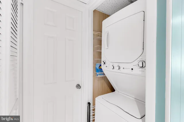 a view of a living room and entryway