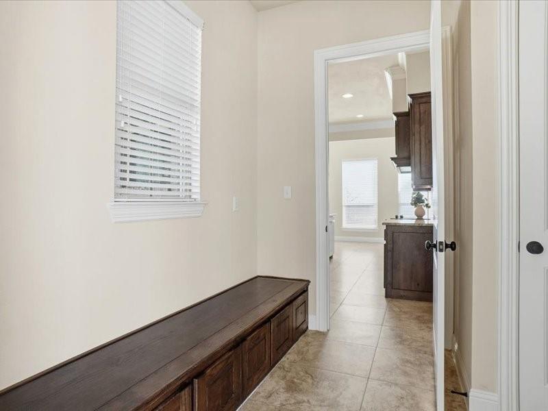 4021 West J E Woody Road Springtown, TX 76082 - Photo 32 of 37 Mudroom in Laundry Area