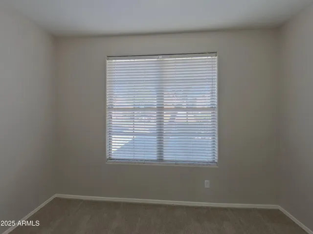 a bathroom with a sink a shower and a mirror