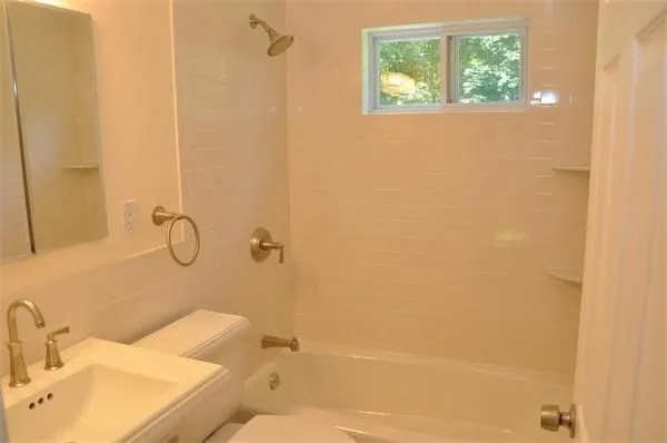a bathroom with a sink and a shower