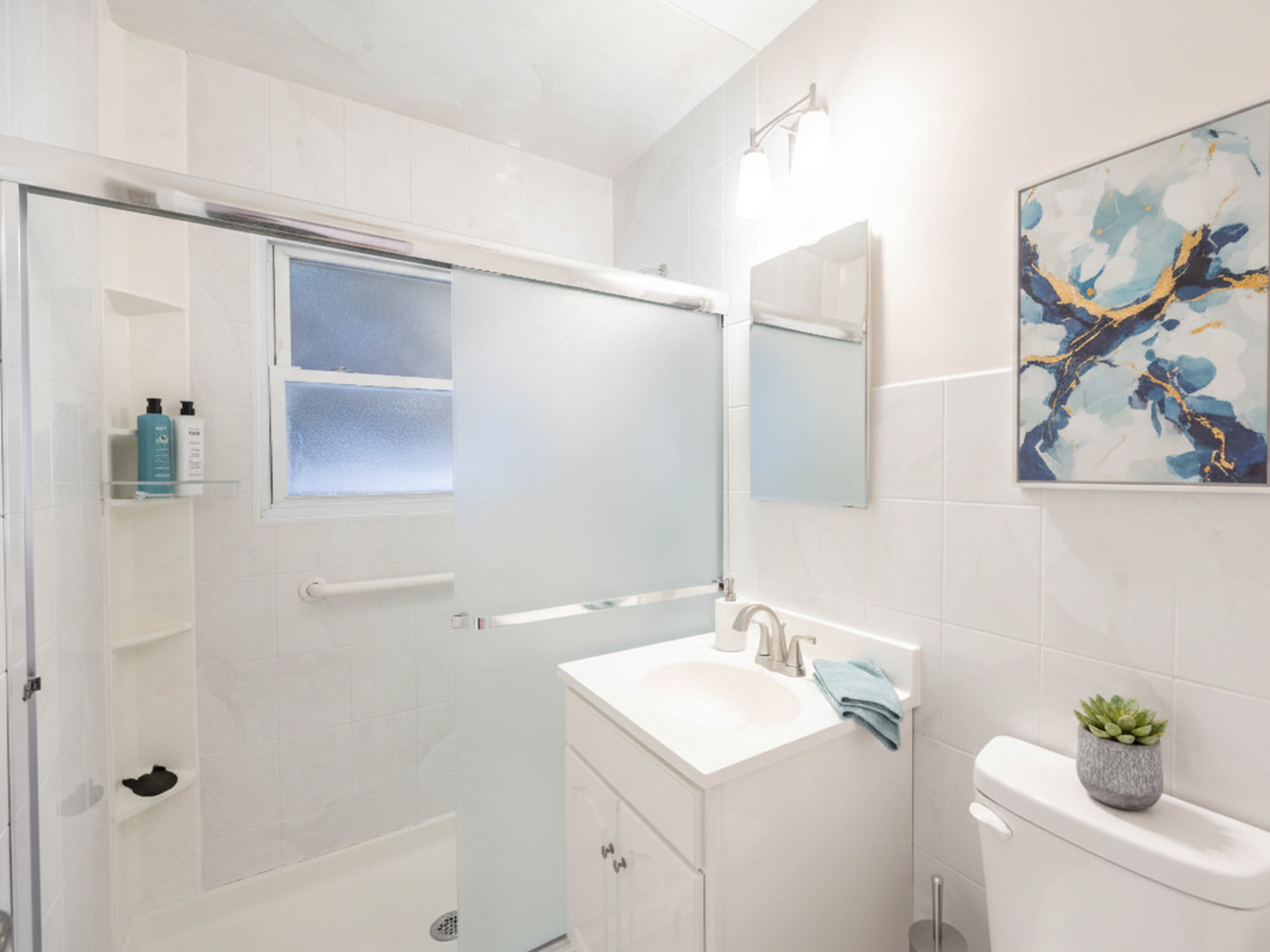 1110 South Gables Boulevard Wheaton, IL 60189 - Photo 8 of 8 a bathroom with a sink a toilet and shower