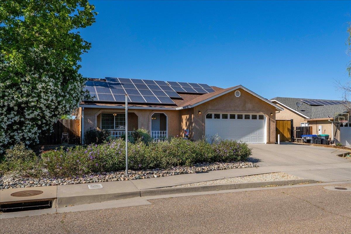 2110 Gentry Way Red Bluff, CA 96080 - Photo 2 of 47 a view of a house with a yard
