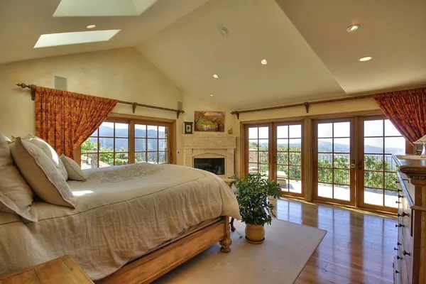 a bed room with a bed and a couch