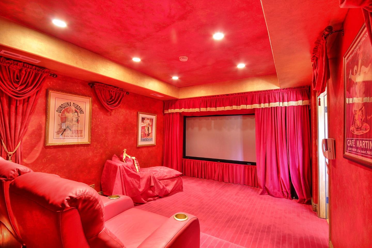 15668 Bohlman Road Saratoga, CA 95070 - Photo 19 of 33 a room with furniture and a flat screen tv