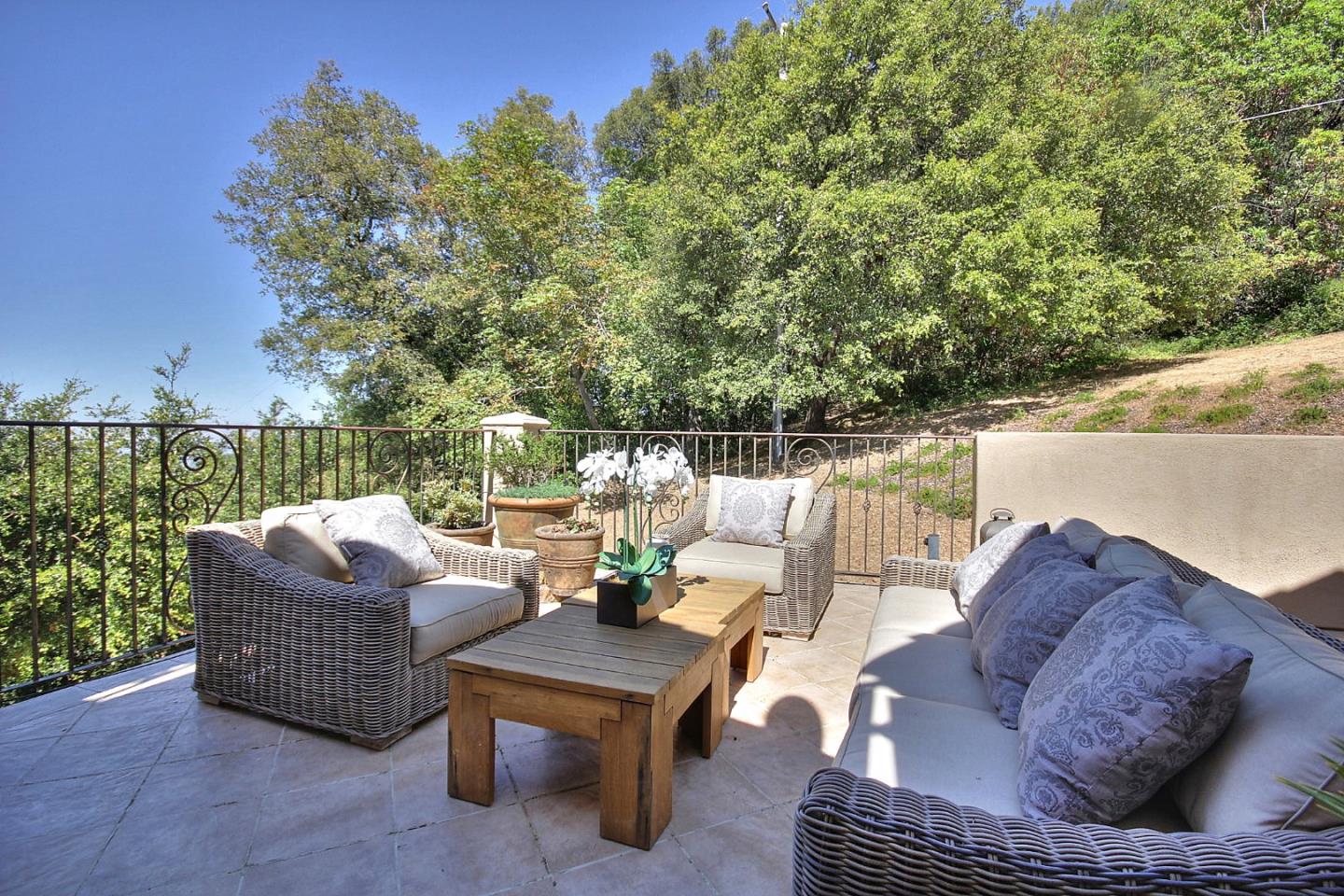 15668 Bohlman Road Saratoga, CA 95070 - Photo 25 of 33 a outdoor living space with furniture and a potted plant