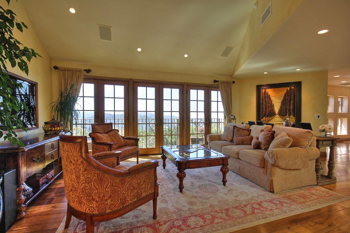 15668 Bohlman Road Saratoga, CA 95070 - Photo 9 of 33 a living room with furniture and a large window