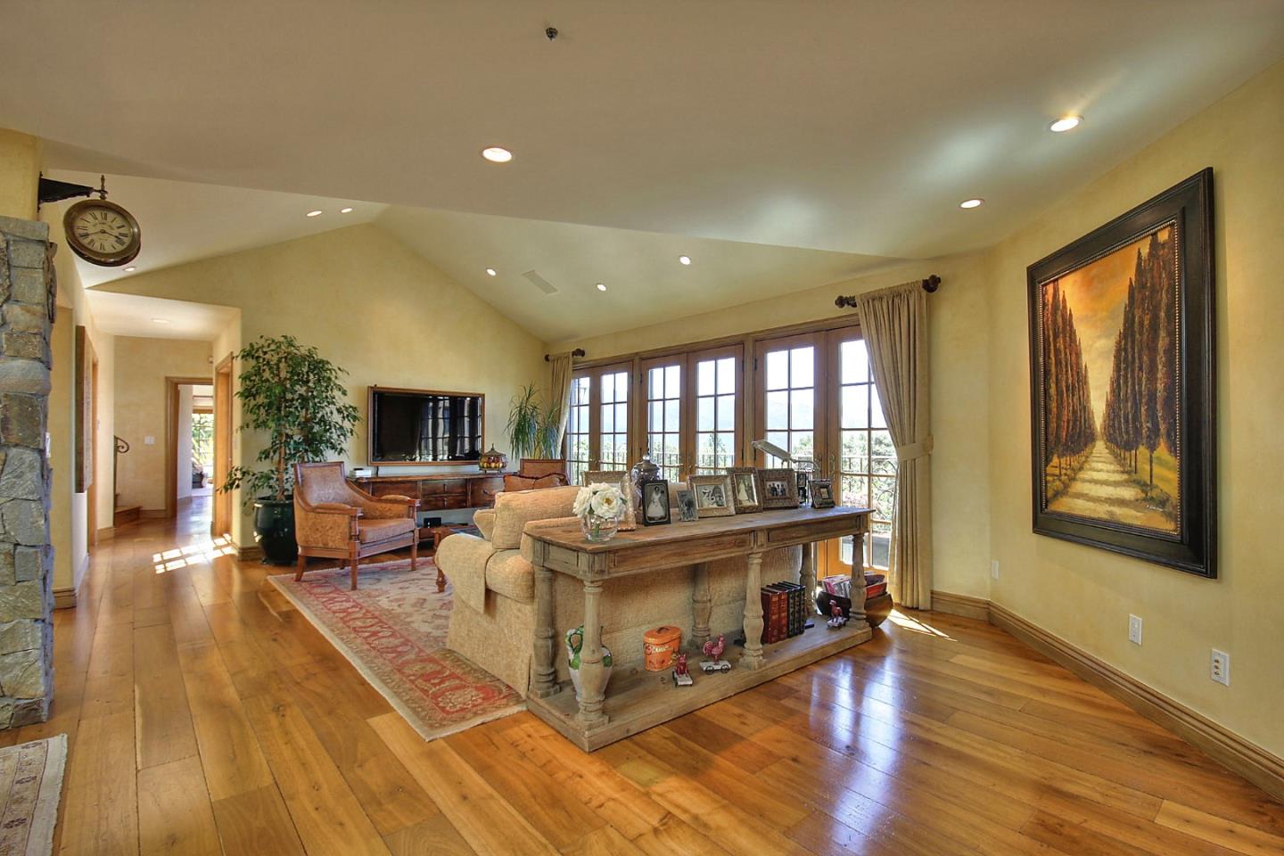 15668 Bohlman Road Saratoga, CA 95070 - Photo 10 of 33 a living room with furniture and a table