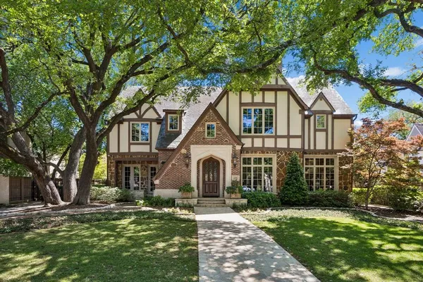 front view of a house with a garden