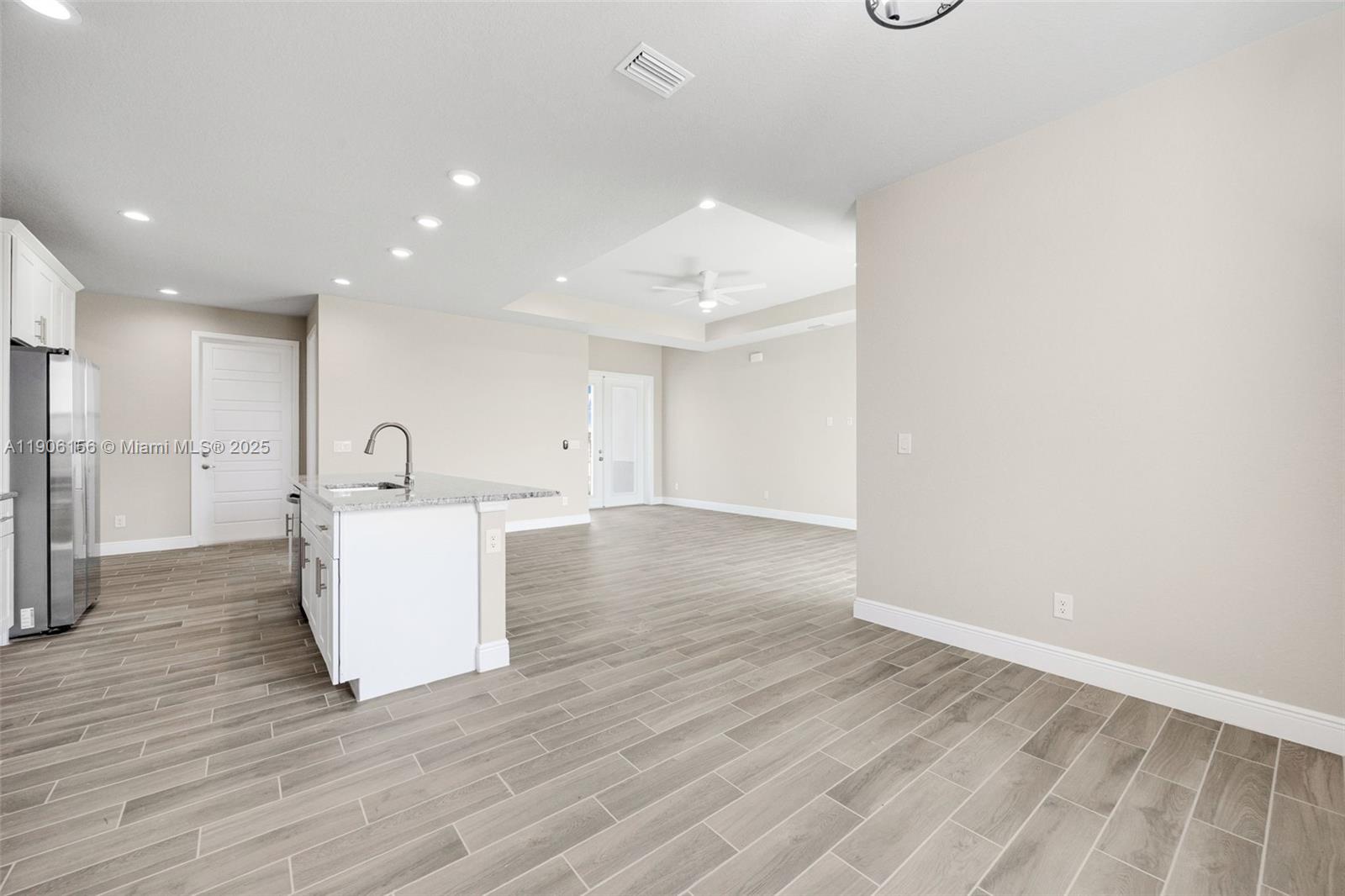 626 Royce Road LaBelle, FL 33935 - Photo 15 of 40 a view of kitchen with furniture and wooden floor