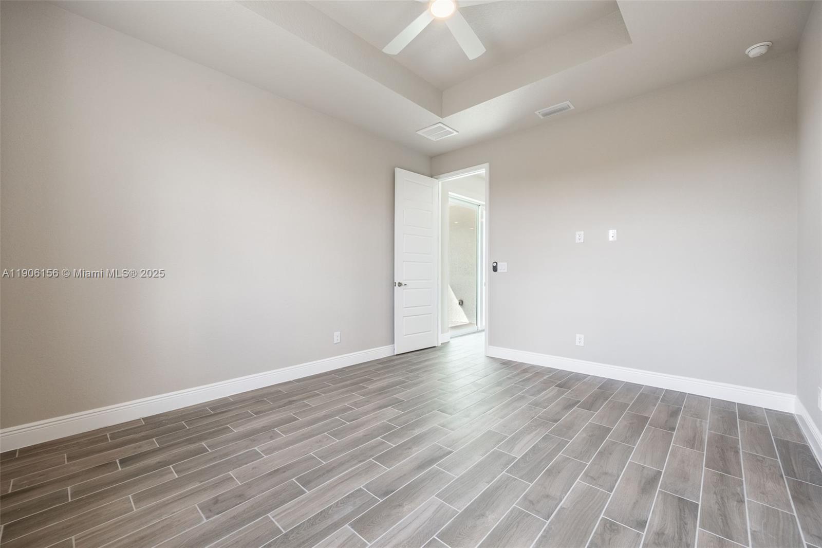 626 Royce Road LaBelle, FL 33935 - Photo 23 of 40 a view of an empty room with wooden floor