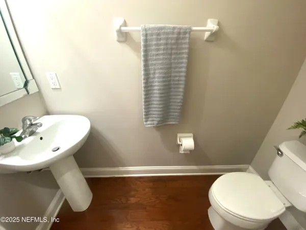 a bathroom with a sink and cabinets