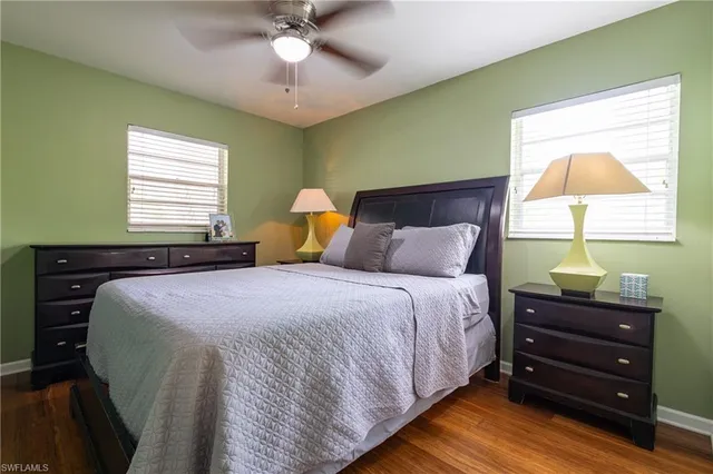 a bedroom with a workspace