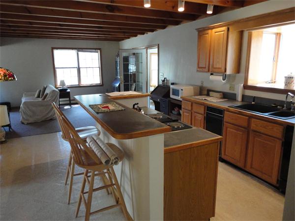 107 Leslie Road Rowley, MA 01969 - Photo 5 of 13 a view of a kitchen counter space and windows