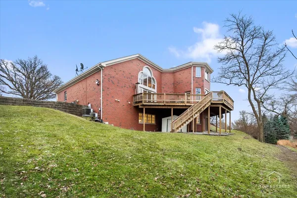 a front view of a house with a balcony