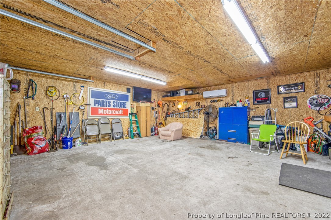 6770 Clinton Road Stedman, NC 28391 - Photo 10 of 39 a view of a garage with storage