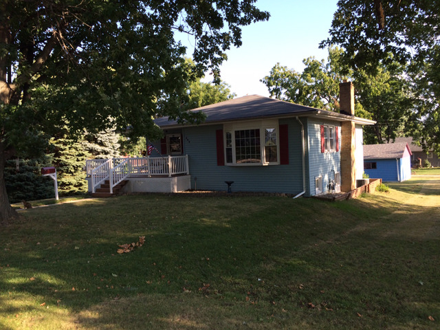 509 West 4th Street Spring Valley, IL 61362 - Photo 1 of 8 a front view of a house with a garden