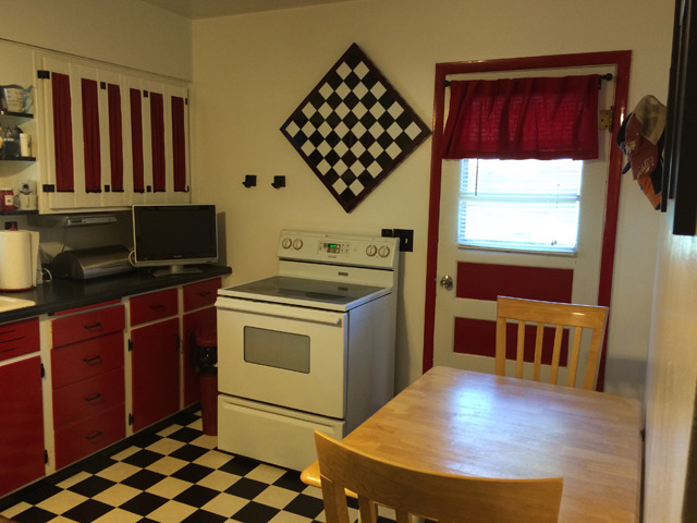 509 West 4th Street Spring Valley, IL 61362 - Photo 3 of 8 a kitchen with granite countertop a stove and a microwave