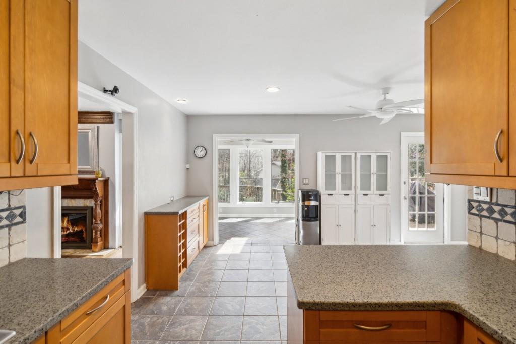 355 Westerhall Court Sandy Springs, GA 30328 - Photo 12 of 37 a living room with stainless steel appliances granite countertop furniture and a kitchen view