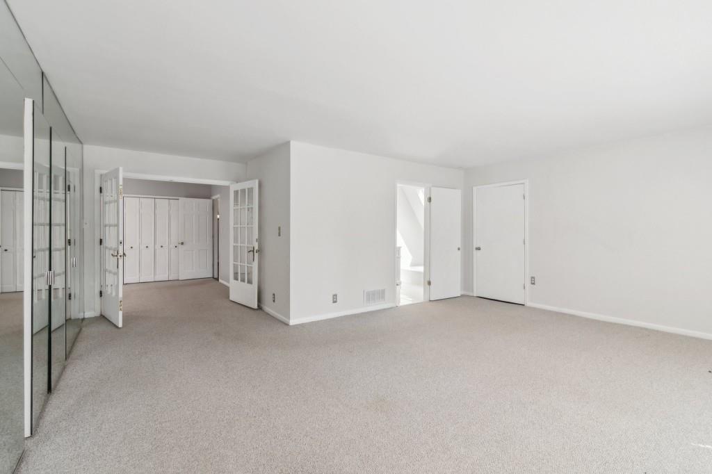 355 Westerhall Court Sandy Springs, GA 30328 - Photo 14 of 37 a view of empty room
