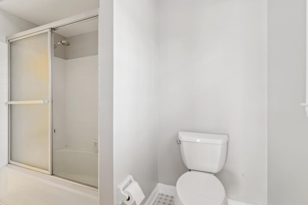 355 Westerhall Court Sandy Springs, GA 30328 - Photo 28 of 37 a bathroom with a toilet