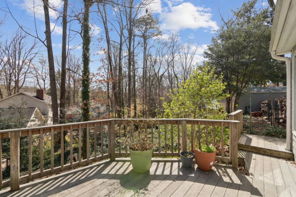 355 Westerhall Court Sandy Springs, GA 30328 - Photo 30 of 37 a view of a balcony with furniture