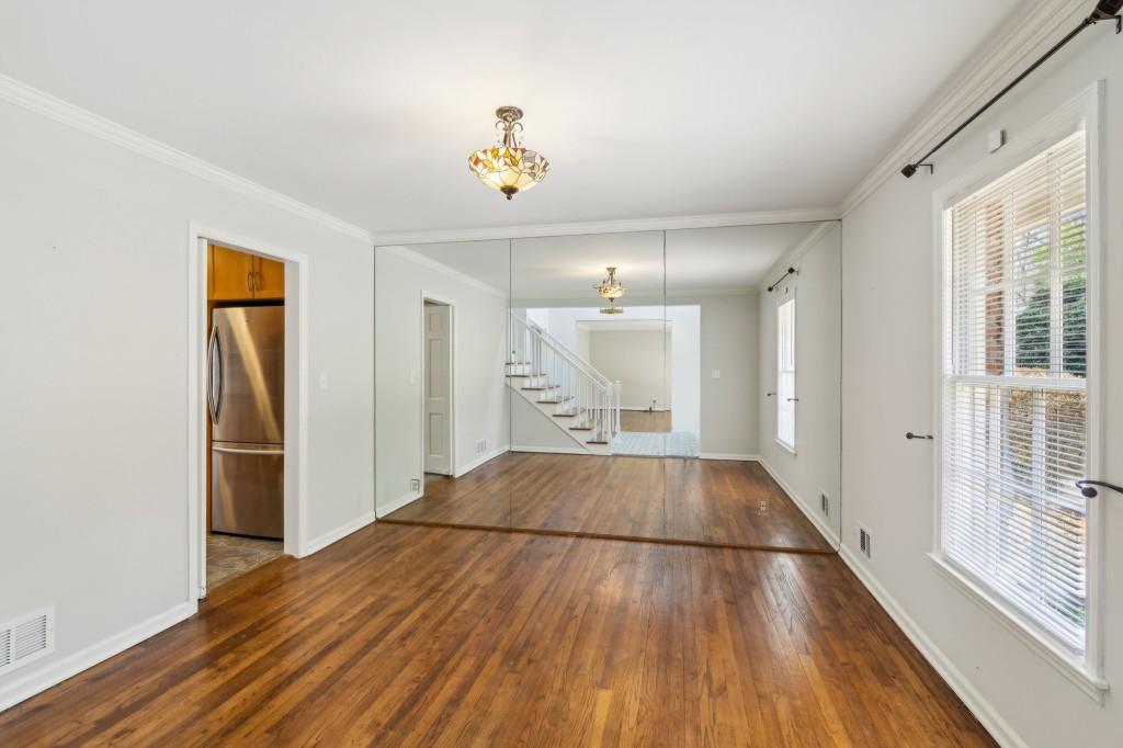 355 Westerhall Court Sandy Springs, GA 30328 - Photo 5 of 37 a view of an empty room and wooden floor