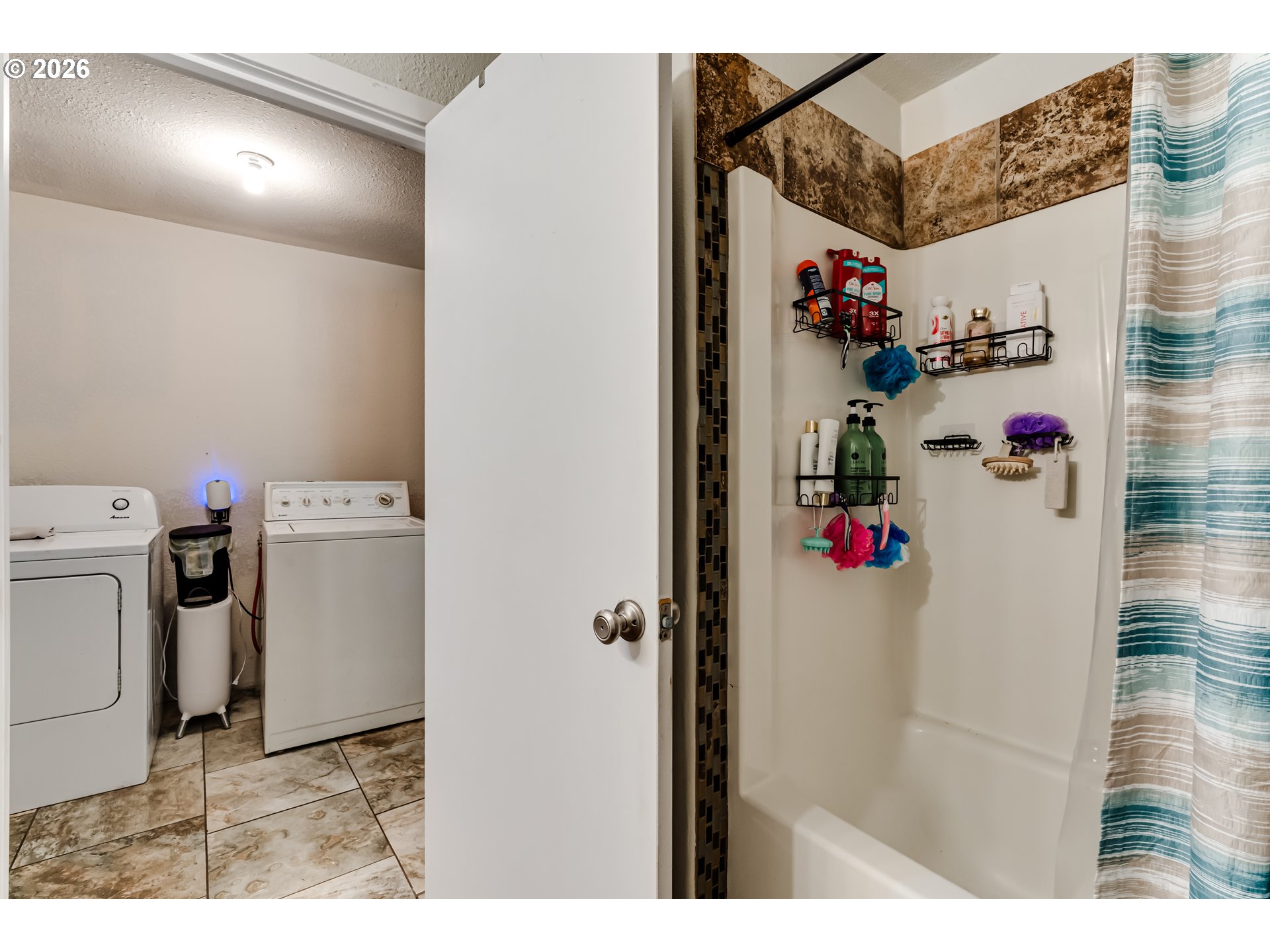 525 21st Street Springfield, OR 97477 - Photo 20 of 33 a view of storage and utility room with washer and dryer
