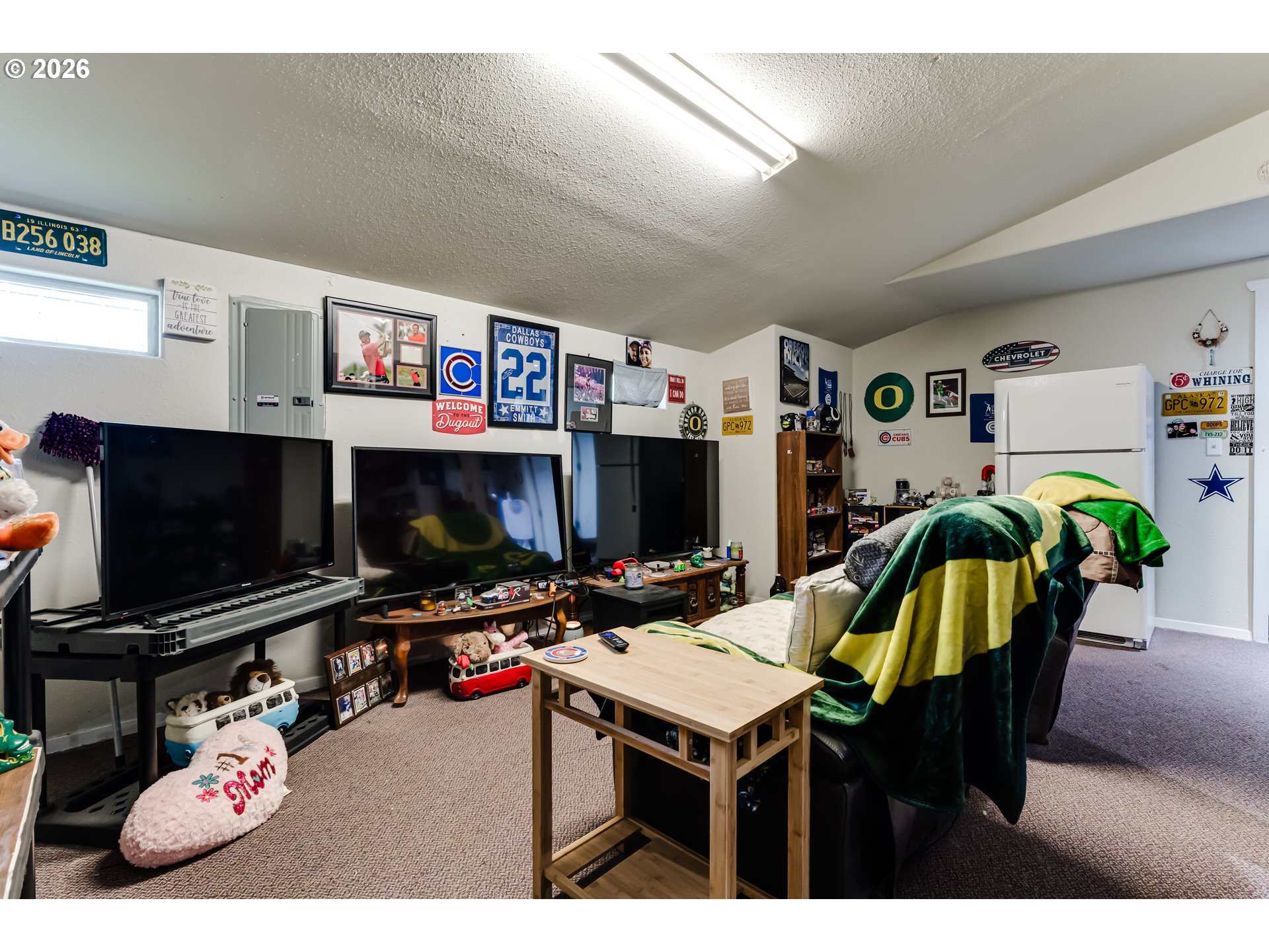 525 21st Street Springfield, OR 97477 - Photo 26 of 33 a living room with furniture and a flat screen tv