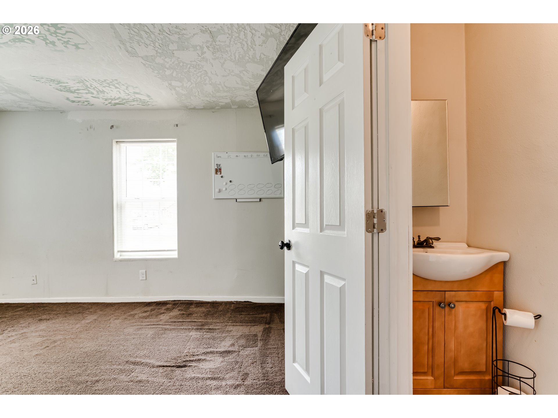 525 21st Street Springfield, OR 97477 - Photo 9 of 33 a bathroom with a sink and a mirror
