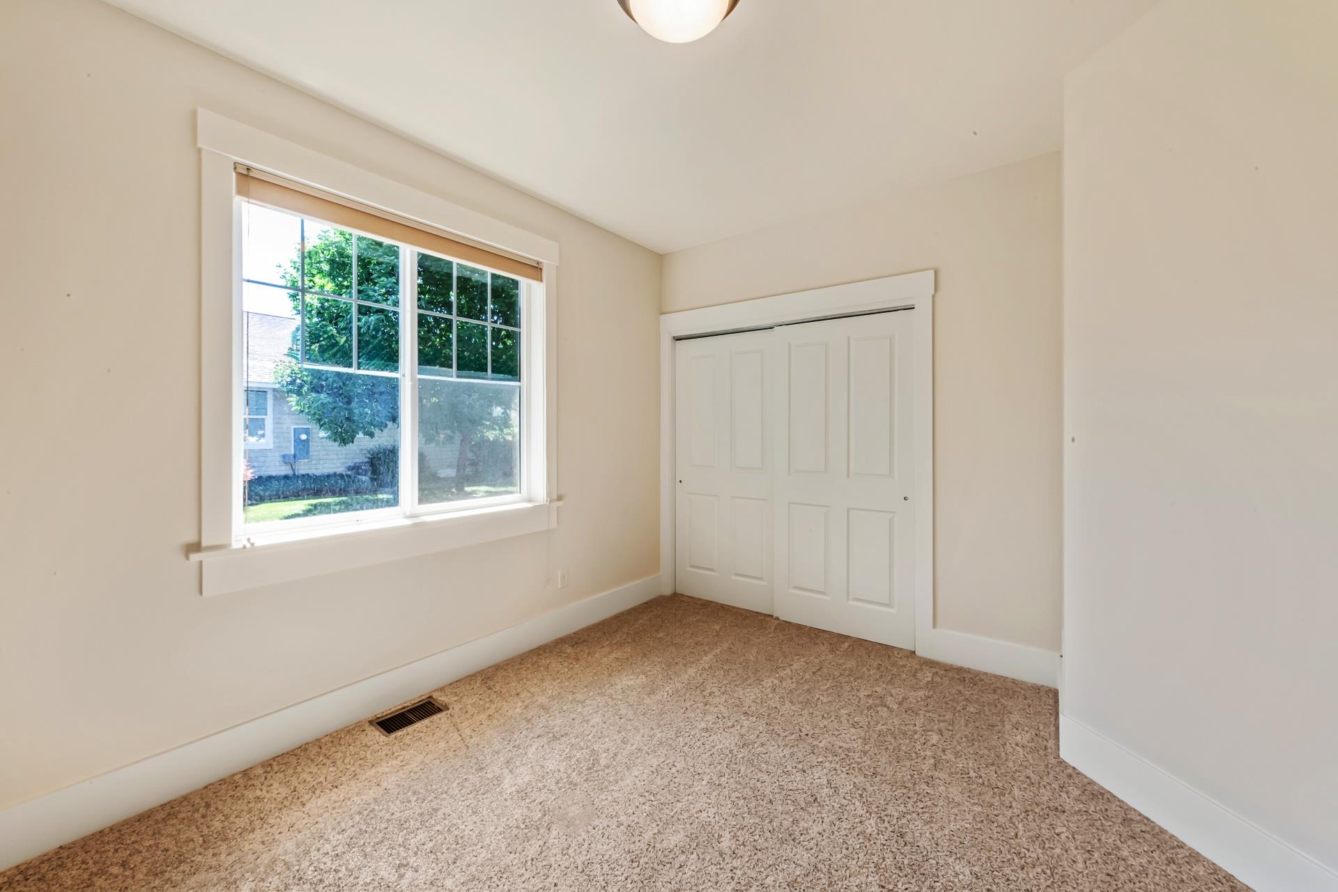 1215 Sunrose Lane, Unit 342 Fruita, CO 81521 - Photo 15 of 19 an empty room with a window
