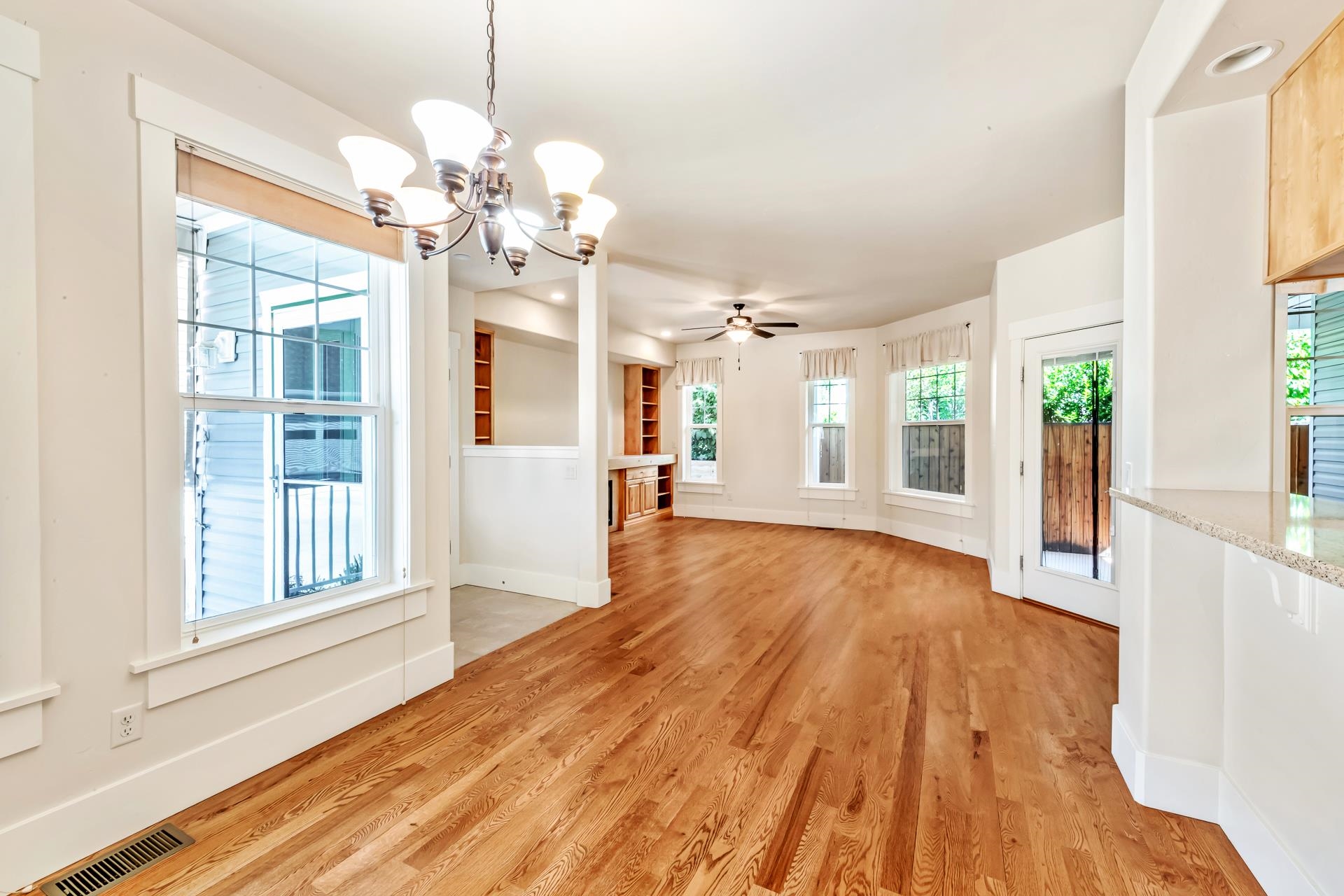 1215 Sunrose Lane, Unit 342 Fruita, CO 81521 - Photo 18 of 19 a view of an empty room with wooden floor and a window