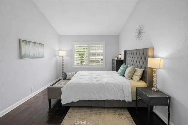 a view of a livingroom with workspace and a window