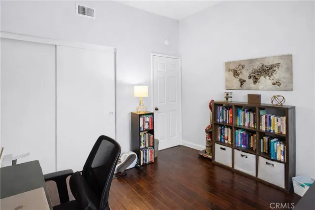 a bathroom with sink a mirror a vanity and shower