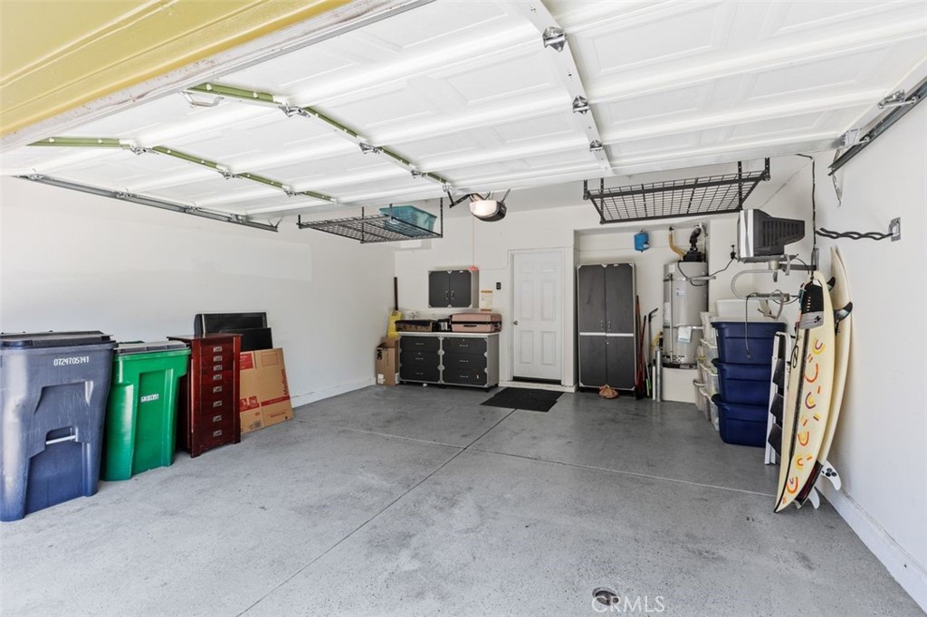 25 Platinum Circle Ladera Ranch, CA 92694 - Photo 33 of 37 Large two car garage with over head storage. There is also a area which 2 cars can be on driveway.