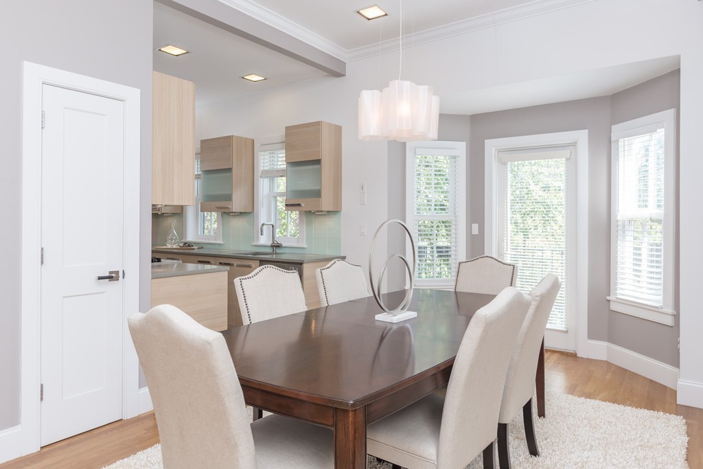61 Dartmouth Street, Unit 1 Boston, MA 02116 - Photo 6 of 24 a view of a dining room with furniture window and wooden floor